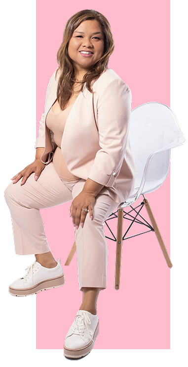 Marjie seated in pink